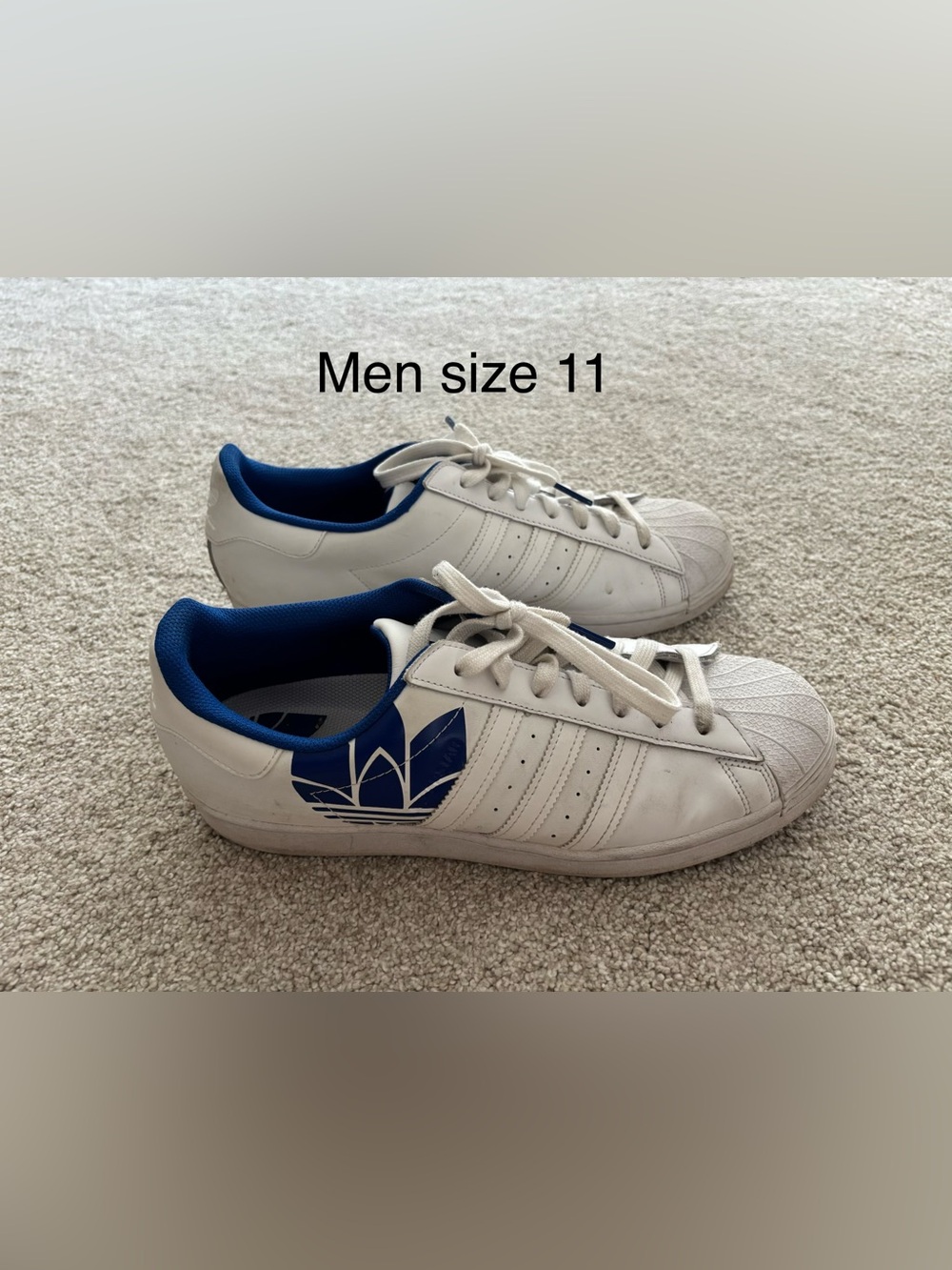 Men size 11 white and blue Addidas sneakers